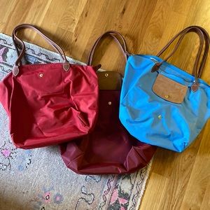Three used longchamp bags